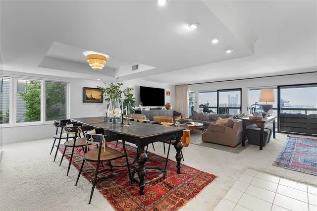 a view of a livingroom with furniture and a window