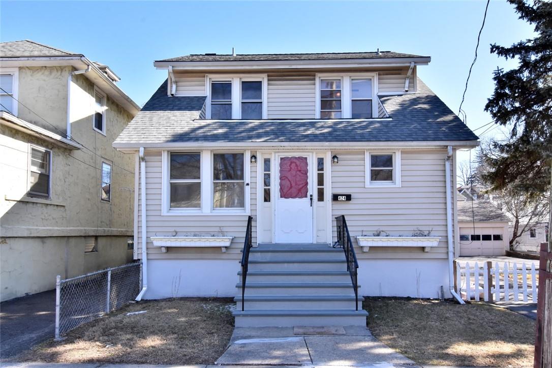 a front view of a house with a garage