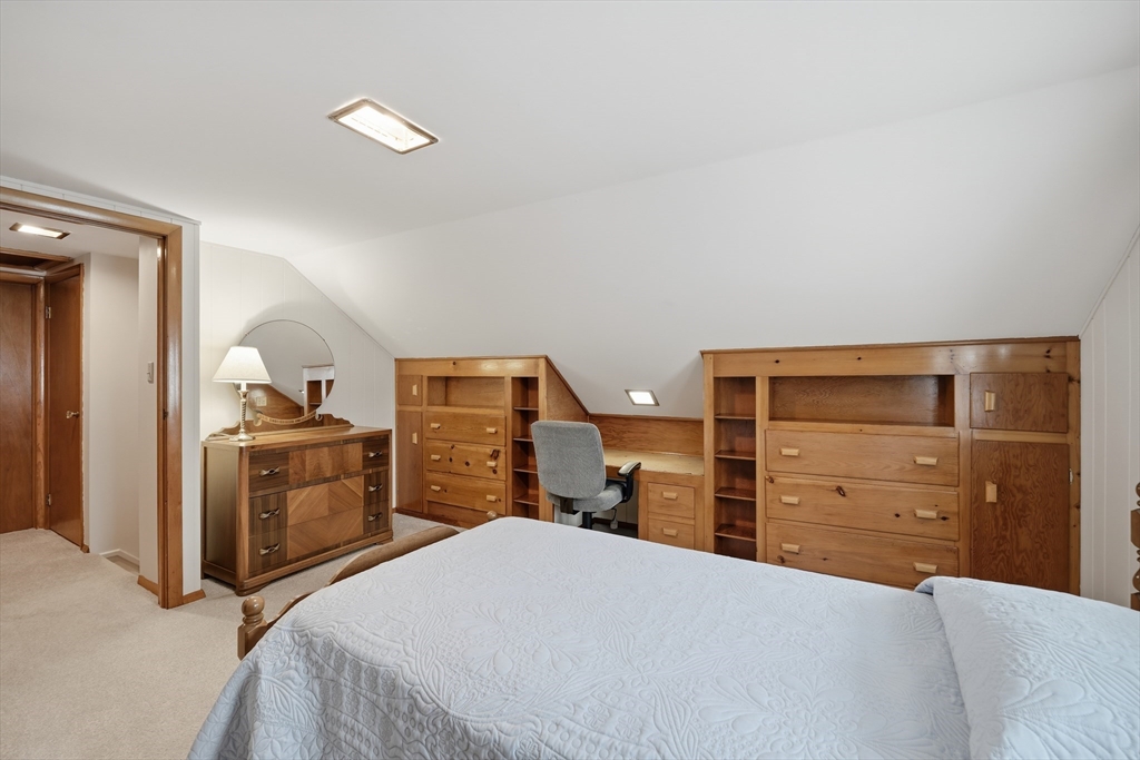 246 El Paso Street Springfield, MA 01104 - Photo 19 of 29 a bedroom with a bed and a dresser