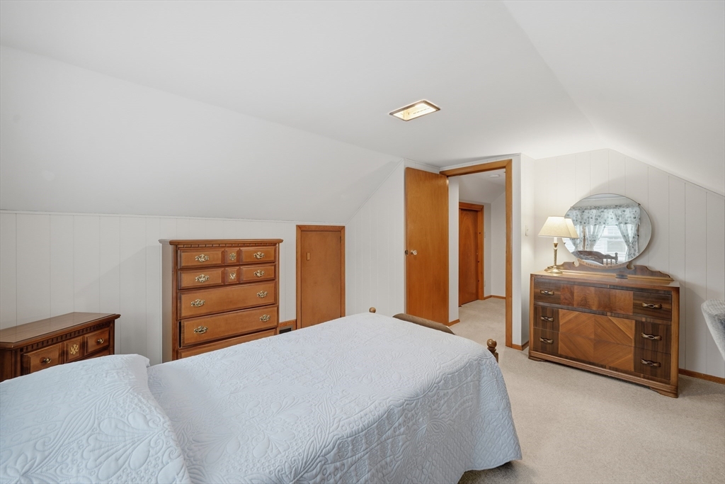 246 El Paso Street Springfield, MA 01104 - Photo 20 of 29 a bedroom with a bed and a dresser