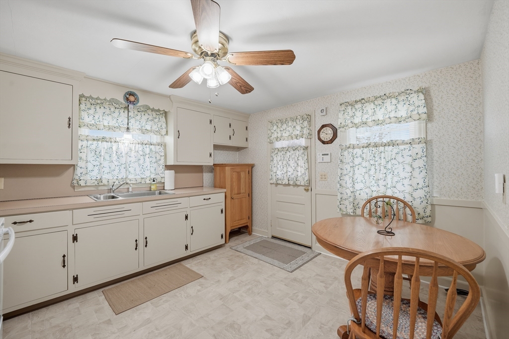 246 El Paso Street Springfield, MA 01104 - Photo 4 of 29 a spacious bathroom with a sink and a mirror