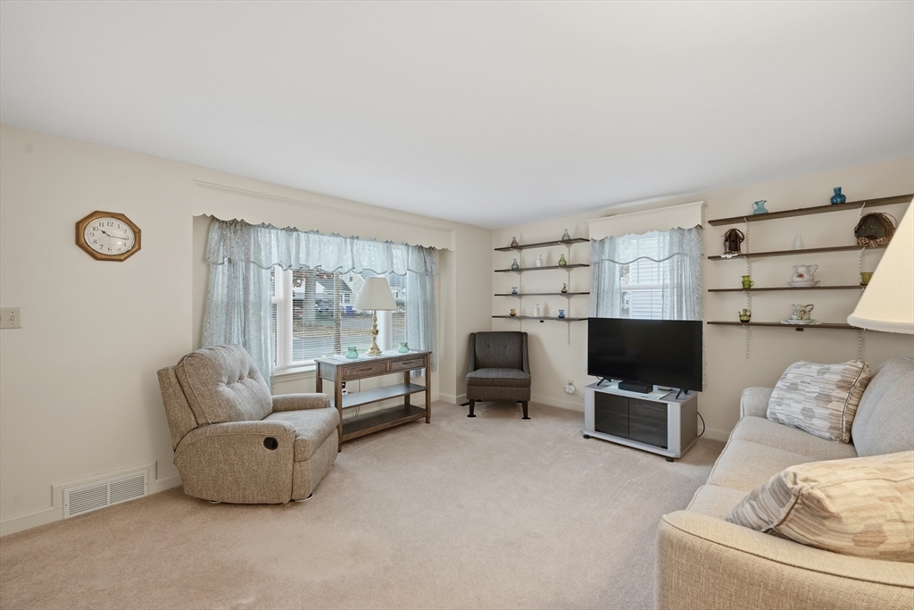 246 El Paso Street Springfield, MA 01104 - Photo 8 of 29 a living room with furniture and a flat screen tv