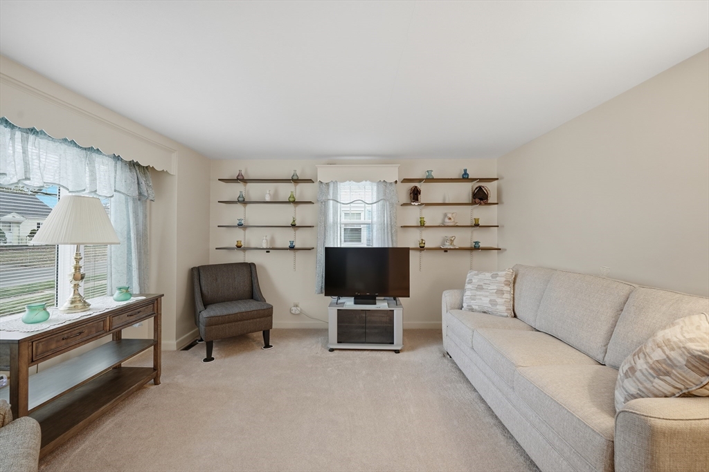 246 El Paso Street Springfield, MA 01104 - Photo 9 of 29 a living room with furniture and a flat screen tv