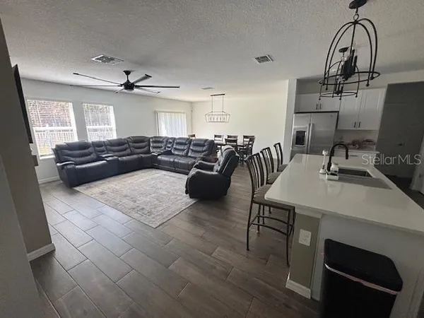 a view of a livingroom with furniture