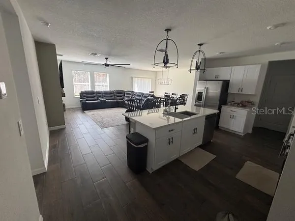 a bedroom with two beds and a window