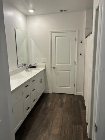 a bathroom with a sink and a toilet