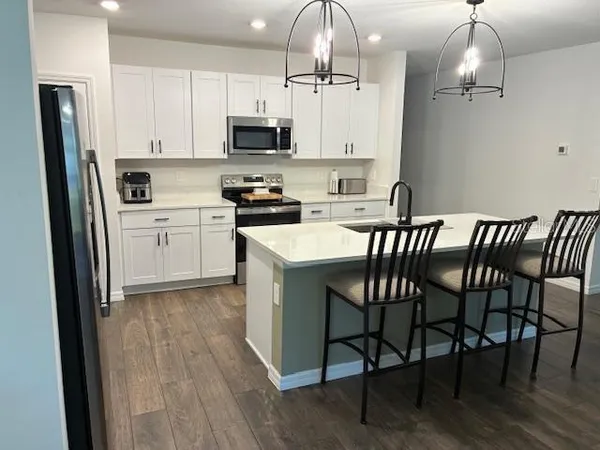 a view of a dining room with furniture