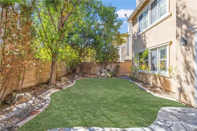 a view of back yard of the house