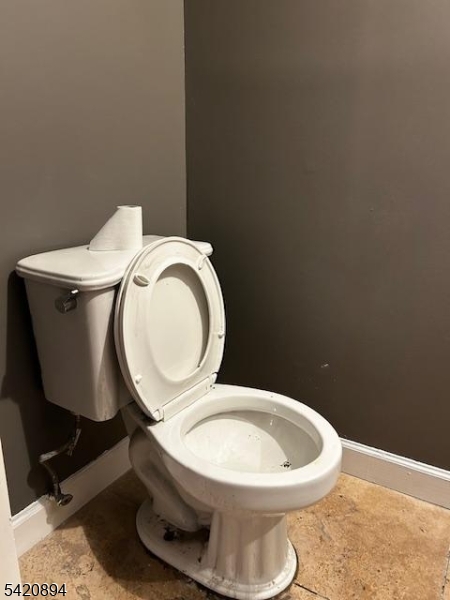 45 Halsey Street Newark, NJ 07102 - Photo 6 of 7 a white toilet sitting next to a bathroom sink