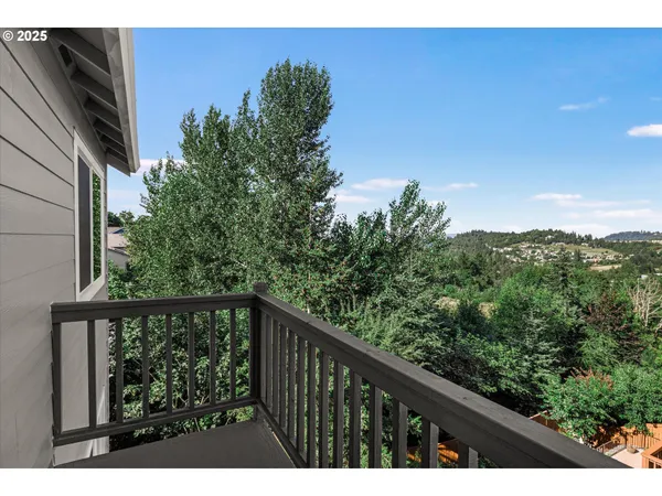 a balcony with an outdoor space