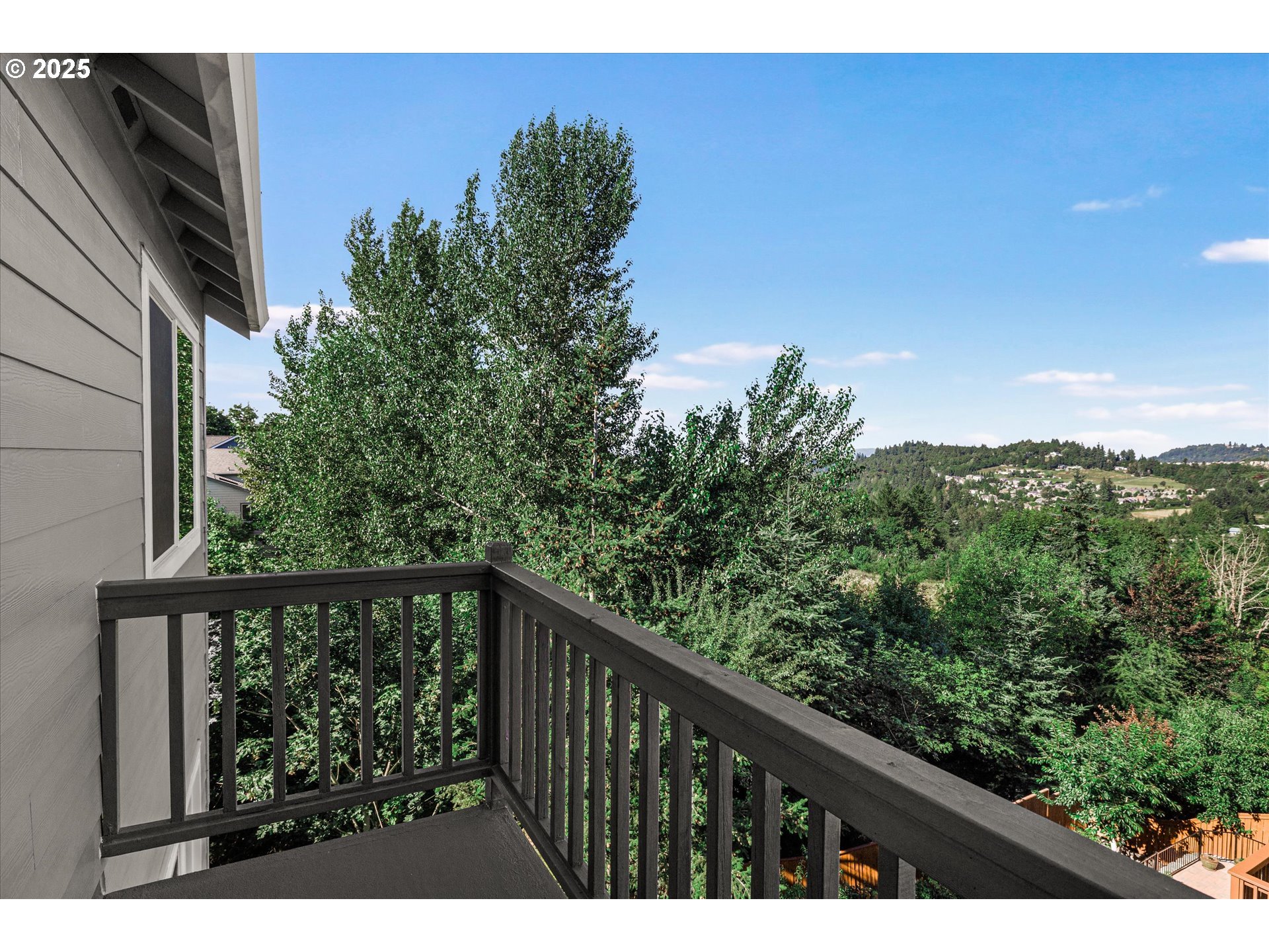 7026 Southeast 156th Avenue Portland, OR 97236 - Photo 25 of 48 a balcony with an outdoor space