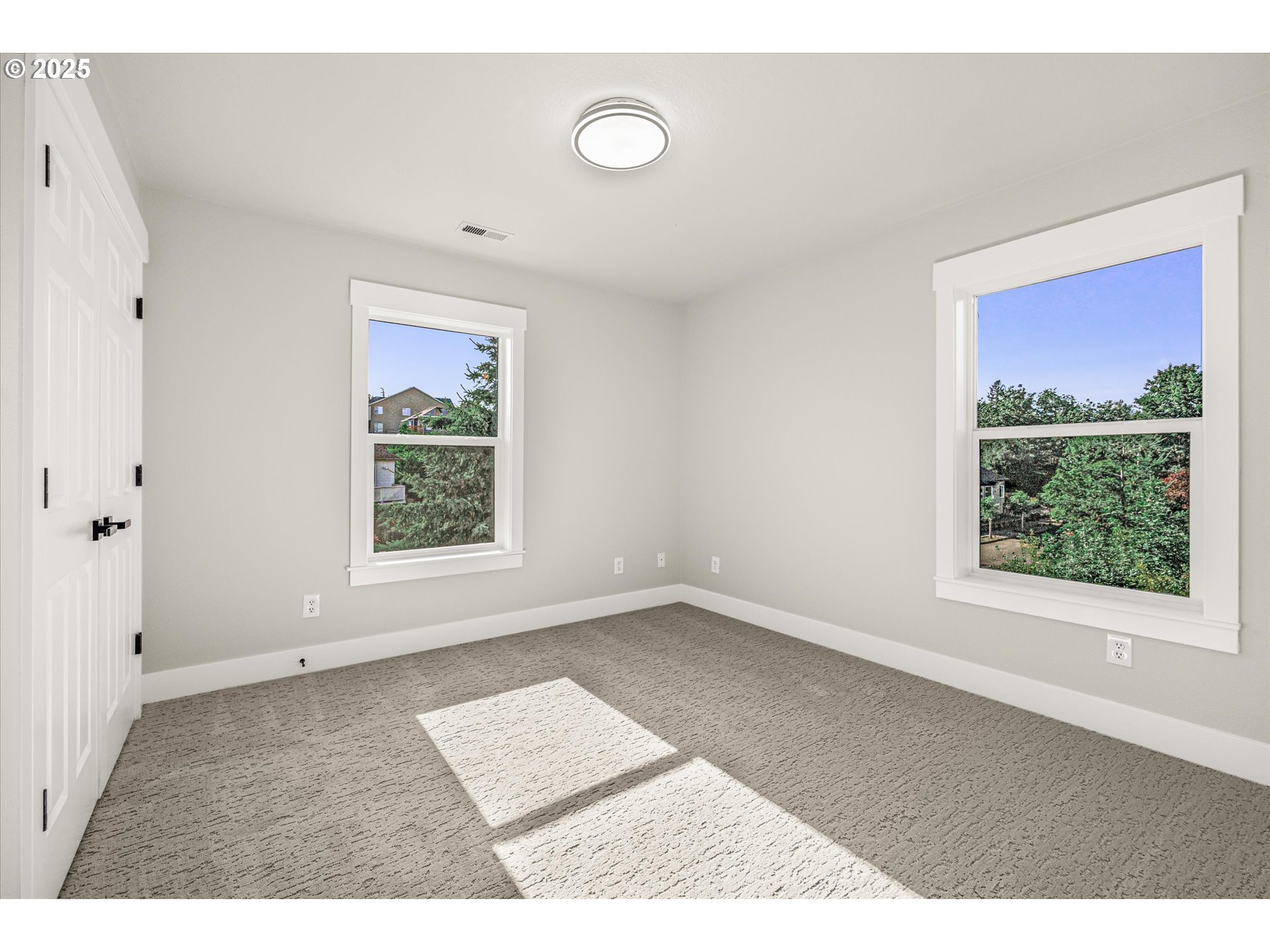 7026 Southeast 156th Avenue Portland, OR 97236 - Photo 27 of 48 a view of an empty room with a window