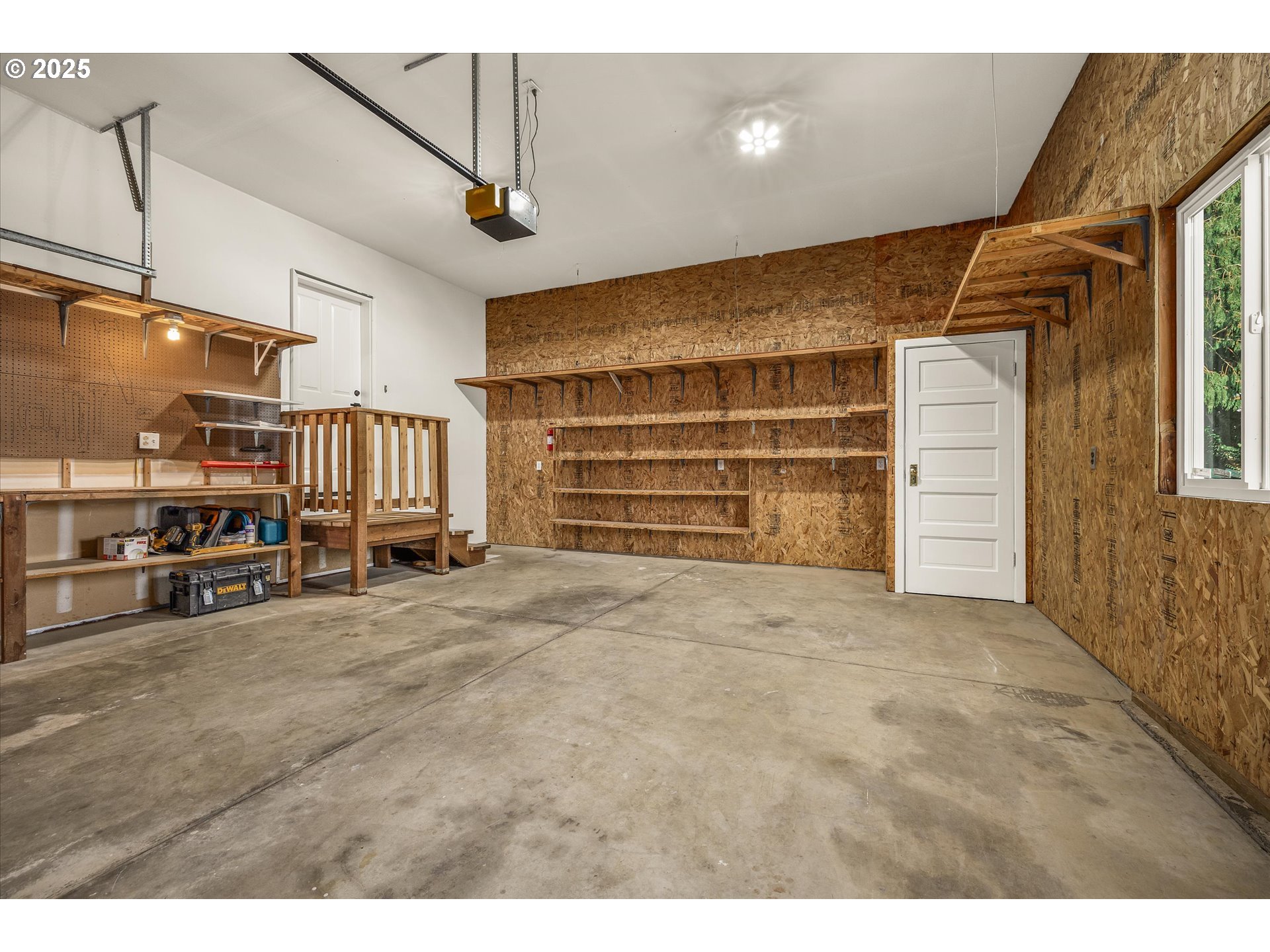 7026 Southeast 156th Avenue Portland, OR 97236 - Photo 42 of 48 a view of an empty room with furniture and a window