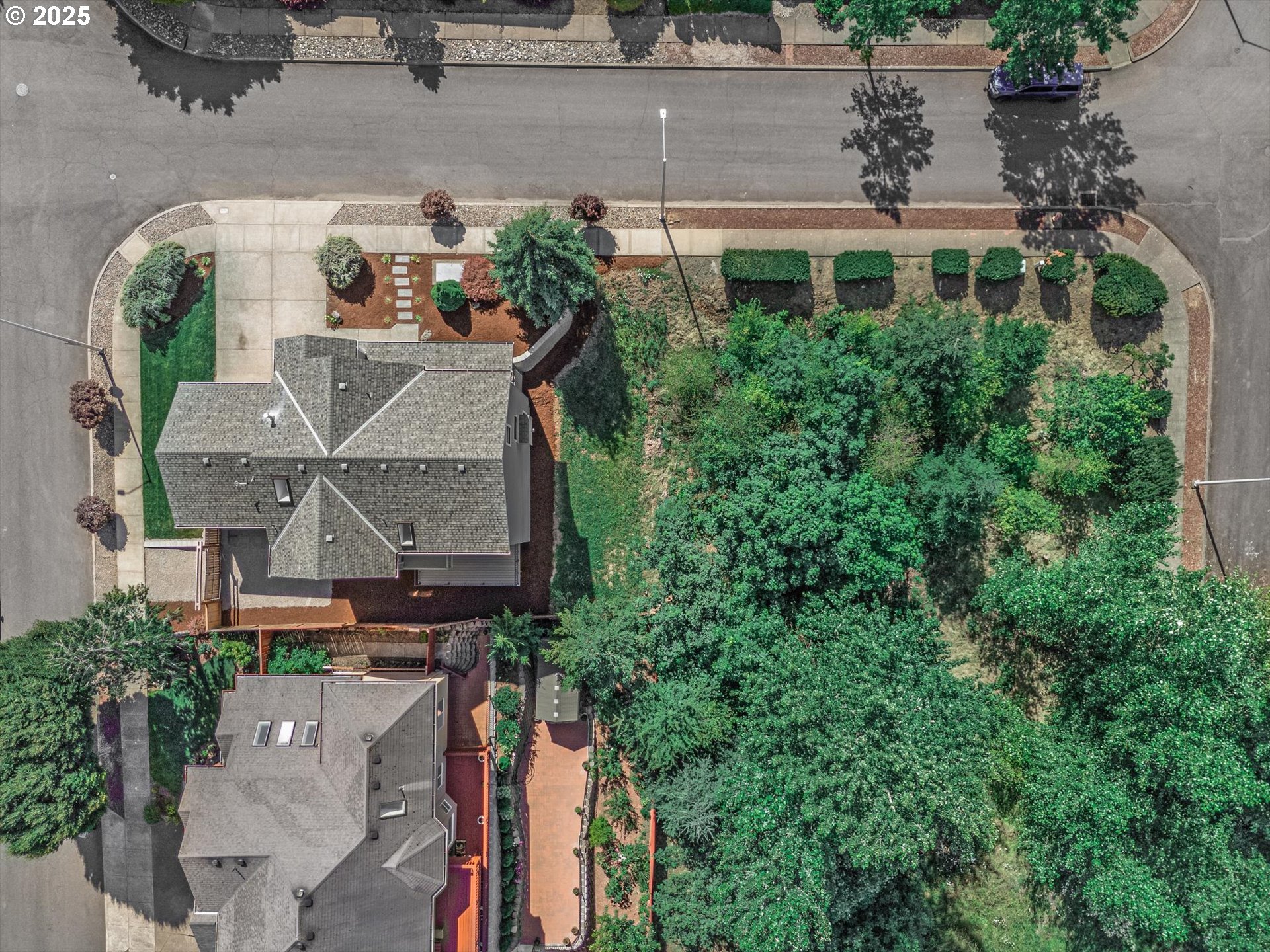 7026 Southeast 156th Avenue Portland, OR 97236 - Photo 43 of 48 an aerial view of a house with a garden