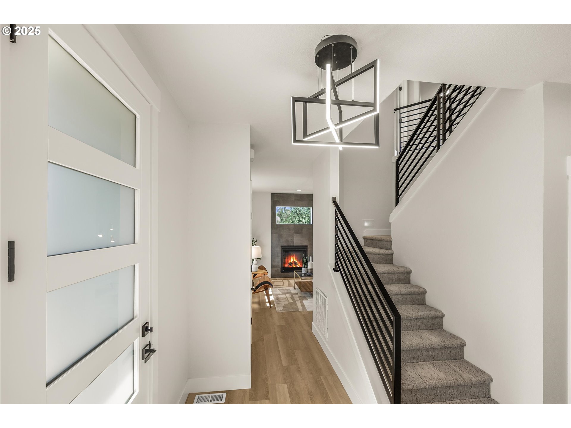 7026 Southeast 156th Avenue Portland, OR 97236 - Photo 5 of 48 a view of entryway and hall with wooden floor