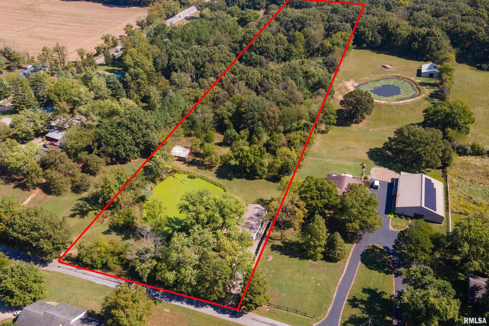 125 Beech Hollow Road Harrisburg, IL 62946 - Photo 5 of 33 a view of a garden