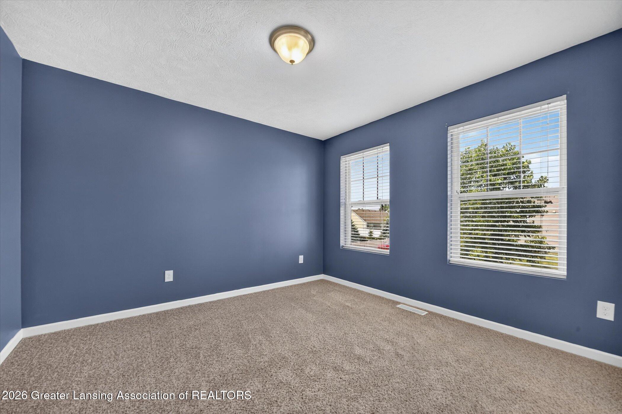47 Lake Ridge Drive Mason, MI 48854 - Photo 27 of 53 28-47-Lake-Ridge-Dr-Windowstill