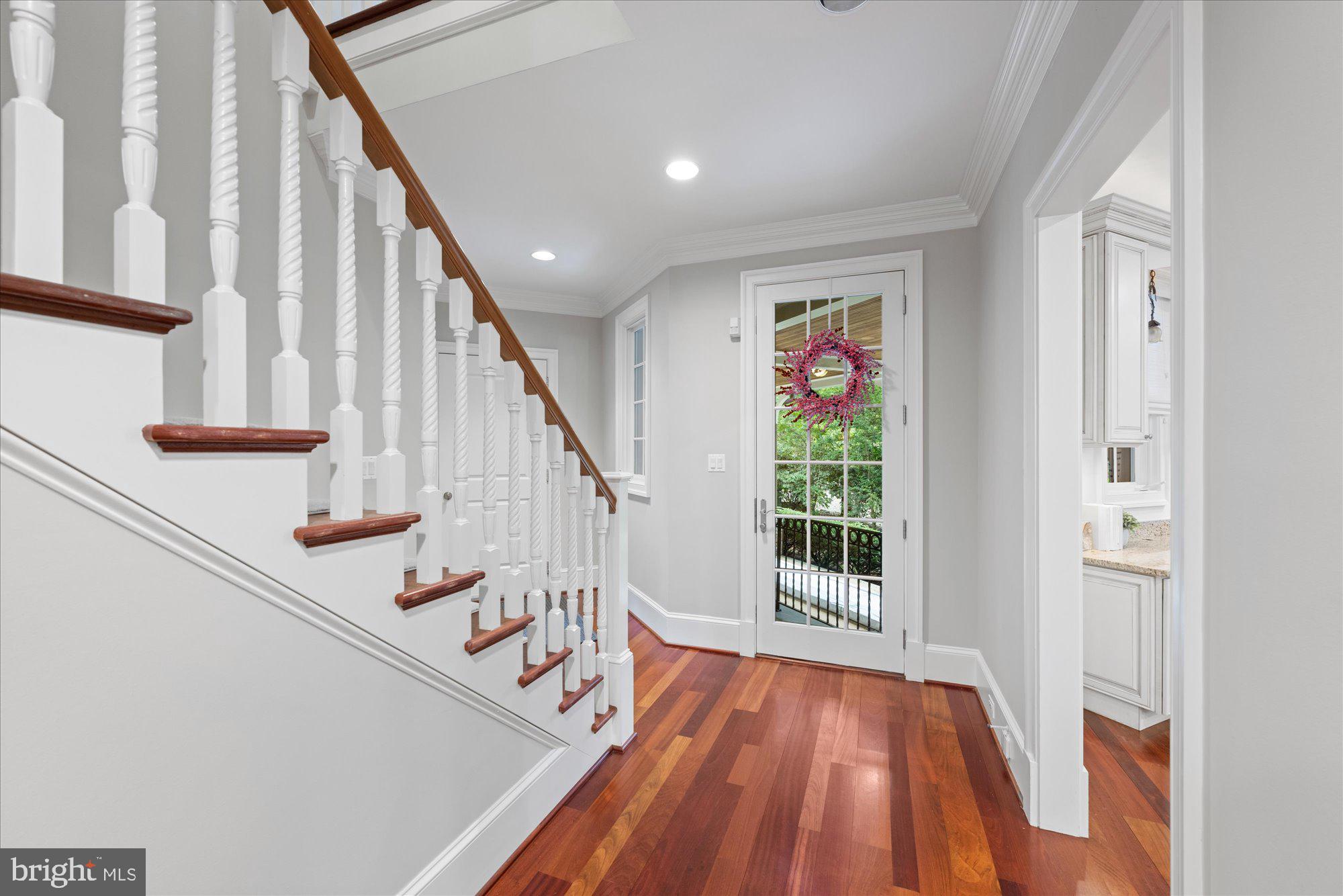 11512 Morning Ride Drive Potomac, MD 20854 - Photo 22 of 51 a view of entryway with wooden floor and stairs