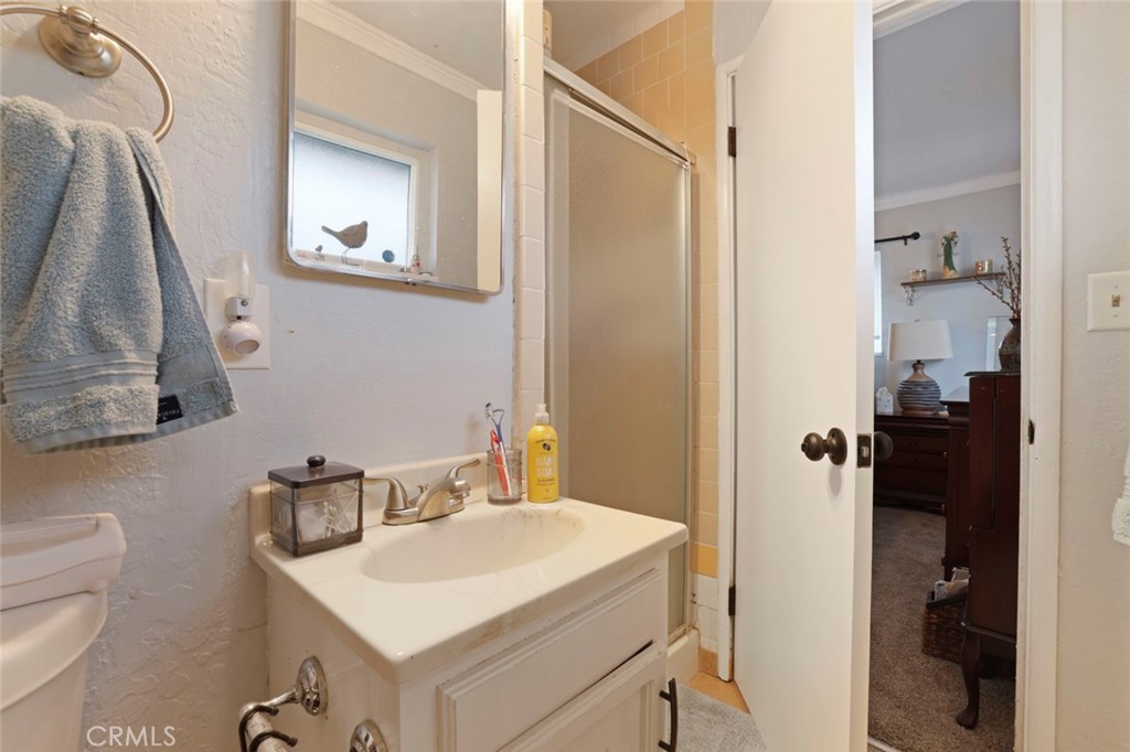 424 Morada Lane Stockton, CA 95210 - Photo 20 of 51 a bathroom with a sink vanity and a toilet