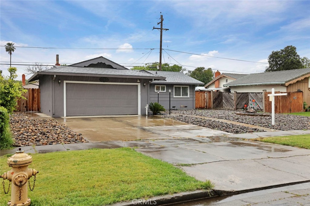 424 Morada Lane Stockton, CA 95210 - Photo 2 of 51 a front view of a house with garden