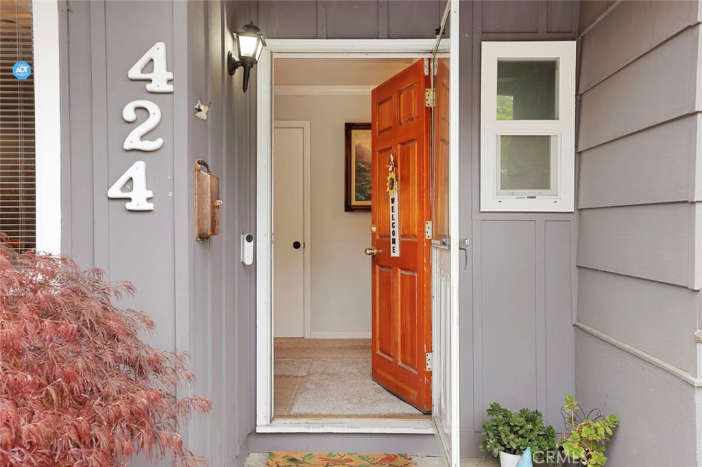 424 Morada Lane Stockton, CA 95210 - Photo 6 of 51 a view of a door house with a glass door