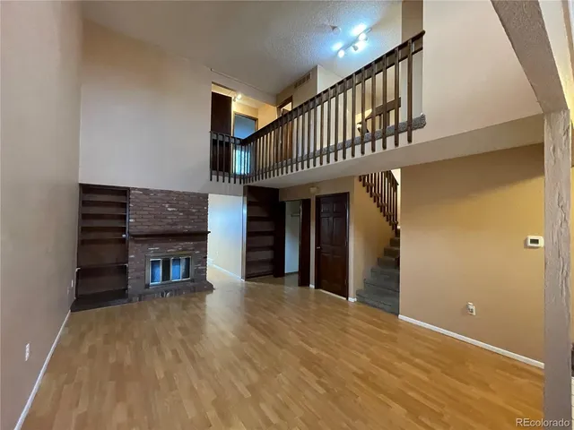 a view of a livingroom with a fireplace