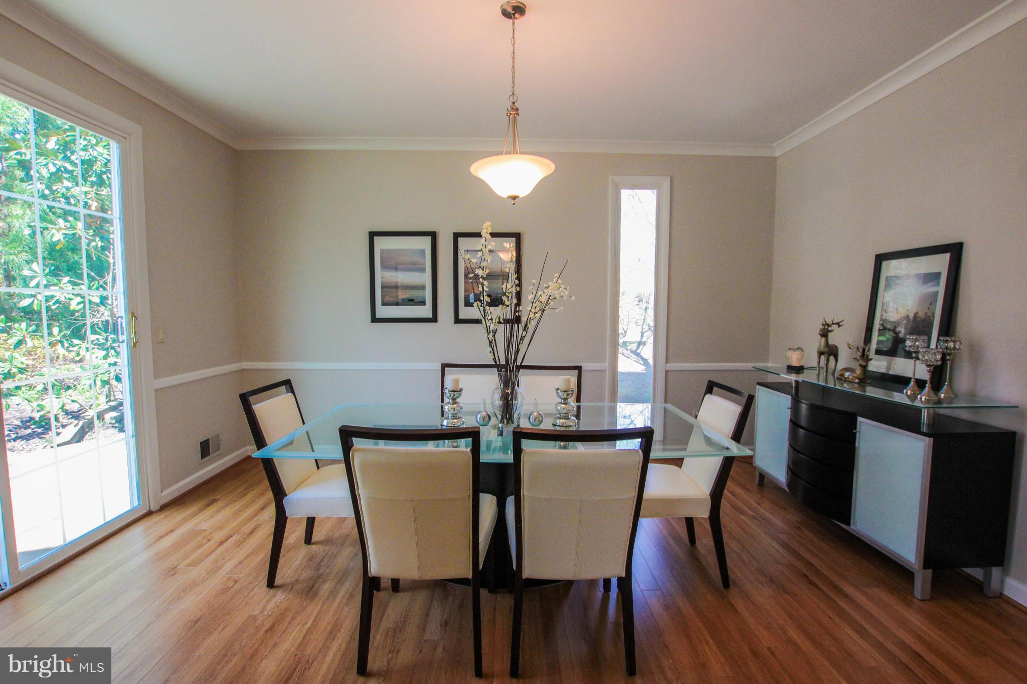 1329 Merrie Ridge Road McLean, VA 22101 - Photo 8 of 30 a view of a dining room with furniture window and wooden floor