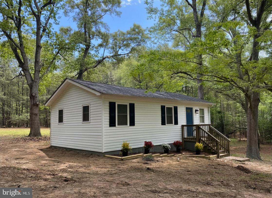 Charming home nestled on almost 4 acres