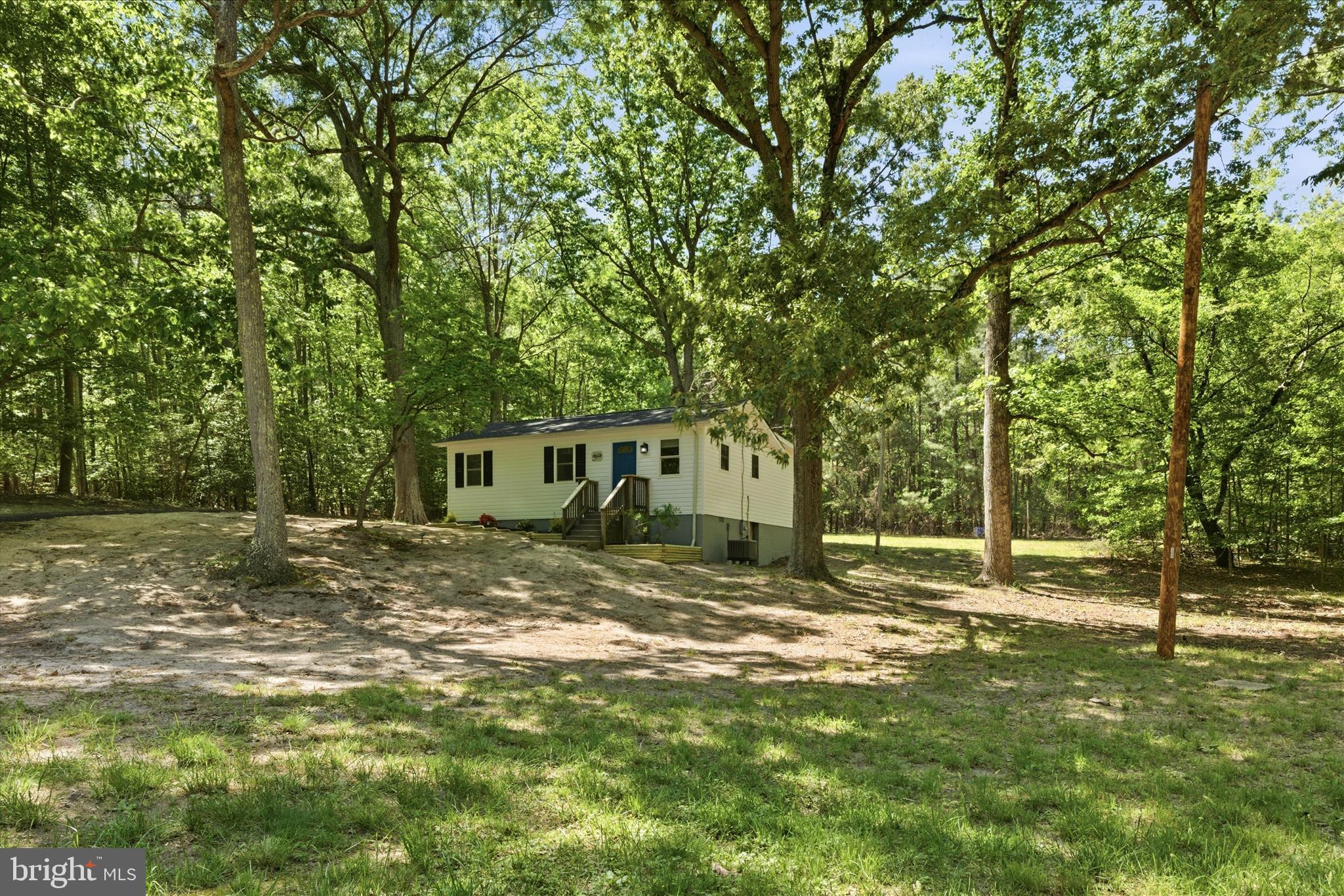 6815 Marshall Road St. Leonard, MD 20685 - Photo 2 of 43 a view of a house with a yard