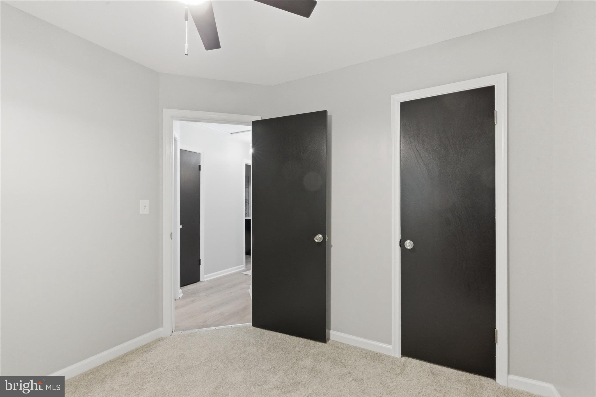6815 Marshall Road St. Leonard, MD 20685 - Photo 24 of 43 a view of a hallway to other door