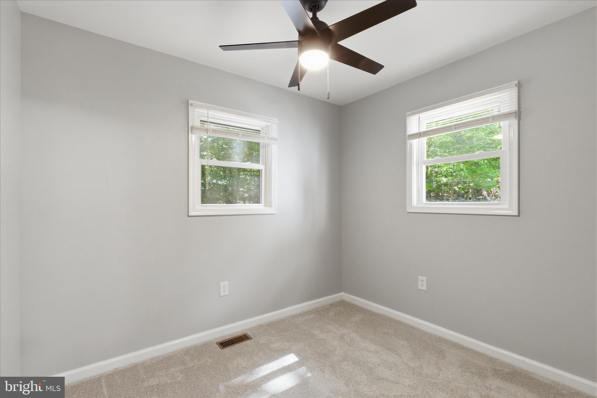 6815 Marshall Road St. Leonard, MD 20685 - Photo 25 of 43 a view of an empty room with a window
