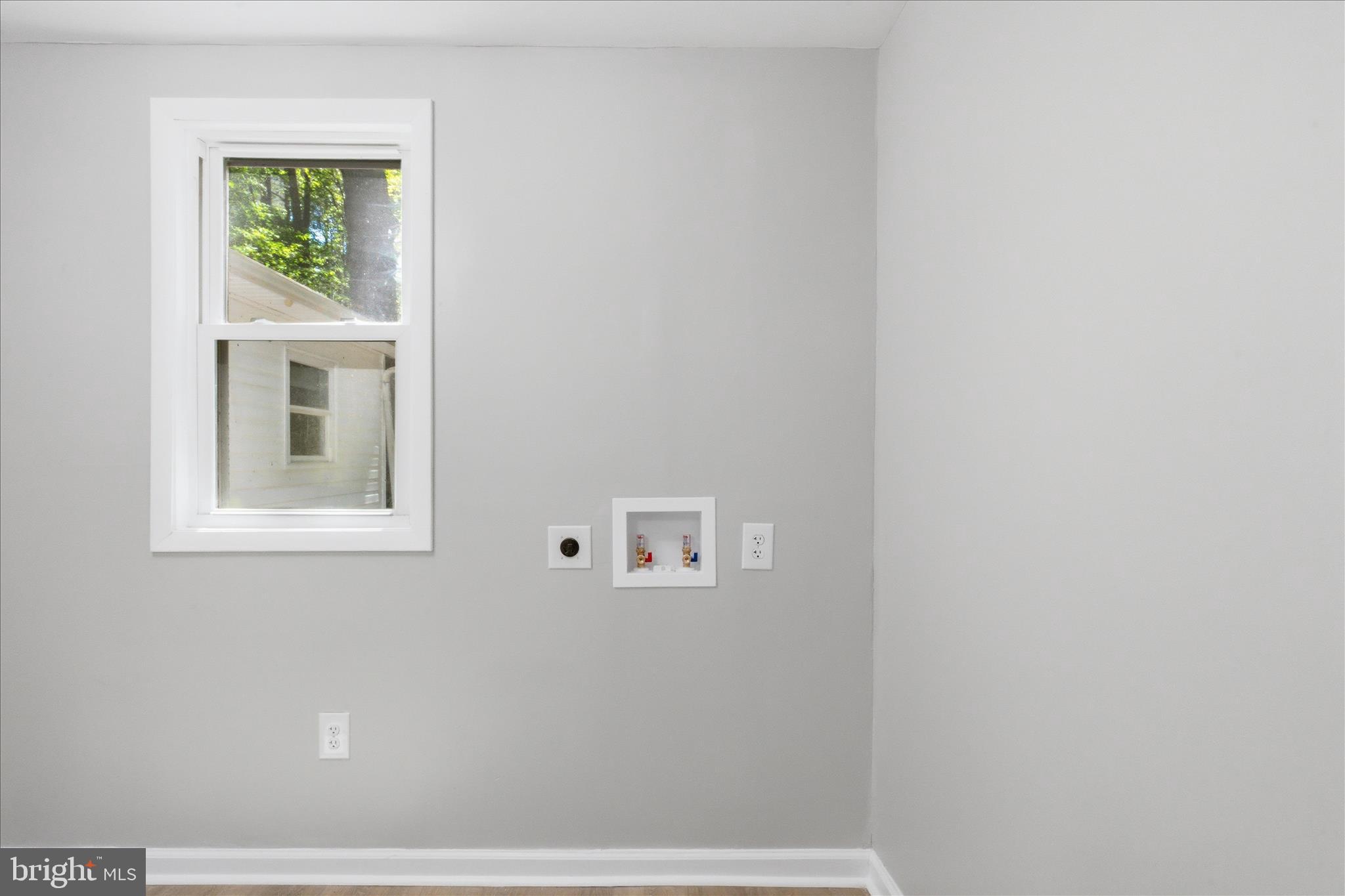 6815 Marshall Road St. Leonard, MD 20685 - Photo 30 of 43 a view of an empty room with a window