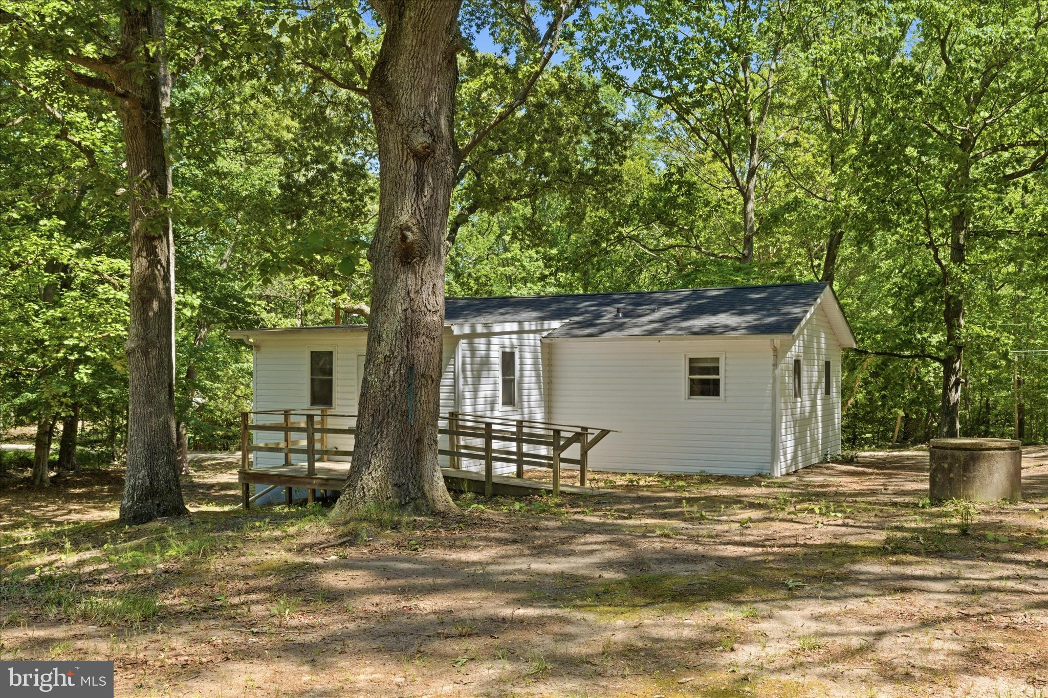 6815 Marshall Road St. Leonard, MD 20685 - Photo 35 of 43 a view of a house with backyard and a tree