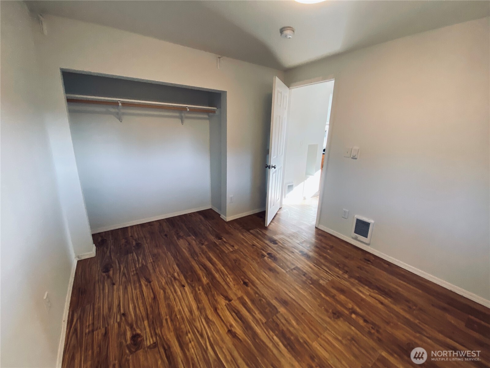 20314 Gun Club Road, Unit B Granite Falls, WA 98252 - Photo 5 of 10 a view of empty room with wooden floor