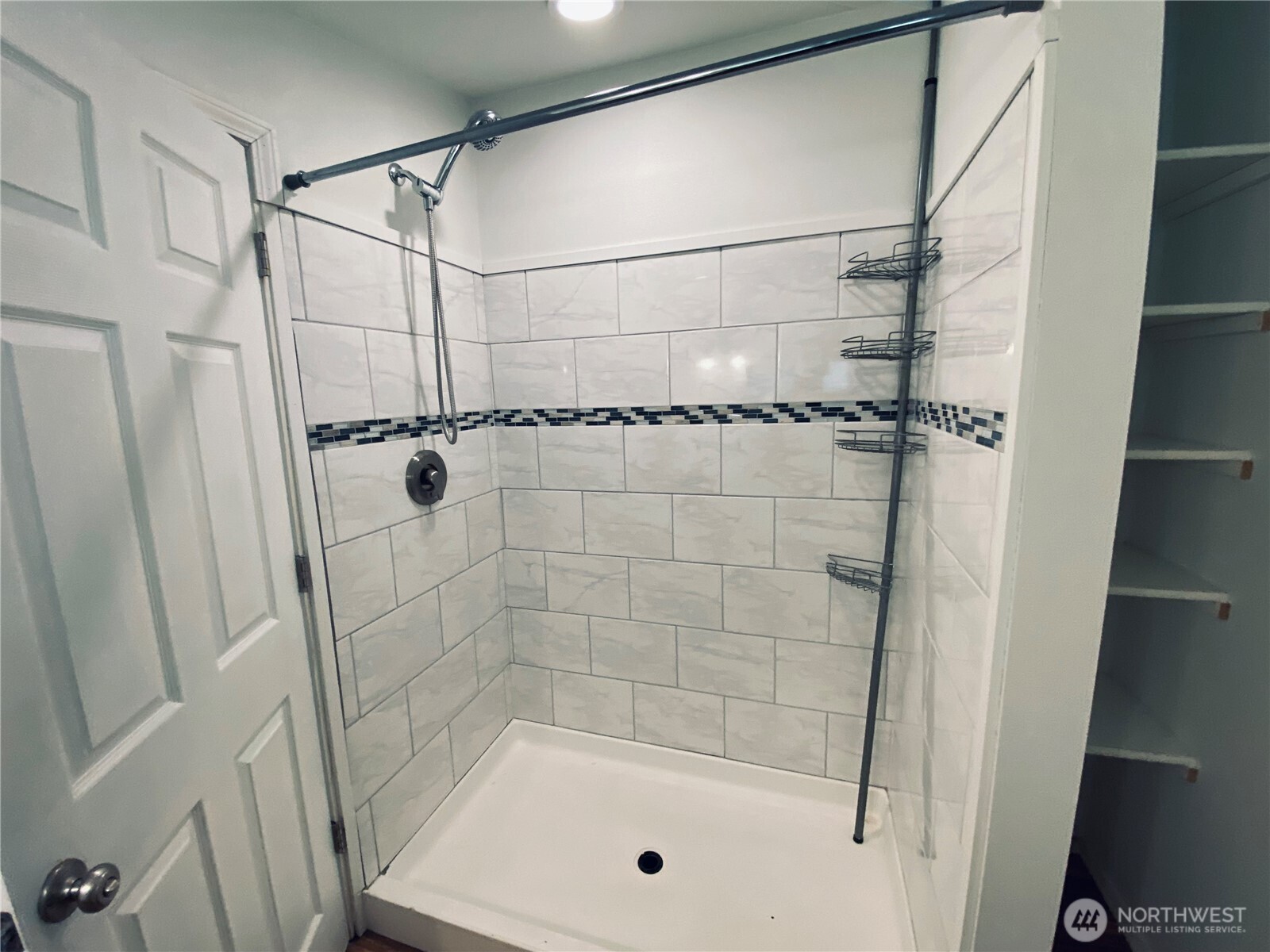 20314 Gun Club Road, Unit B Granite Falls, WA 98252 - Photo 7 of 10 a bathroom with a shower