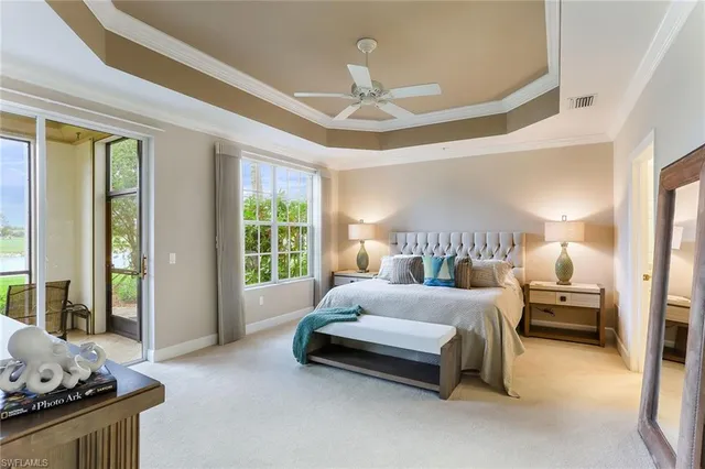 a spacious bedroom with a bed and window