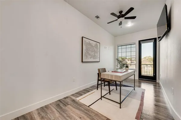 a workspace with furniture and window