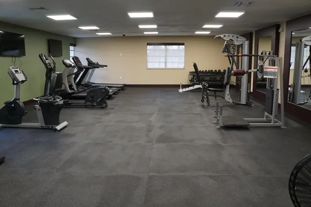 a view of a room with gym equipment