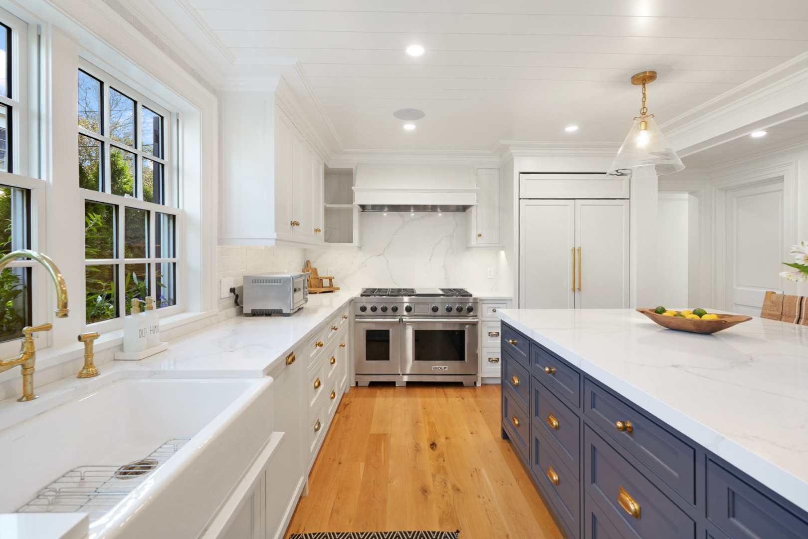 56 North Summer Street Edgartown, MA 02539 - Photo 14 of 77 a kitchen with stainless steel appliances granite countertop a stove and a sink