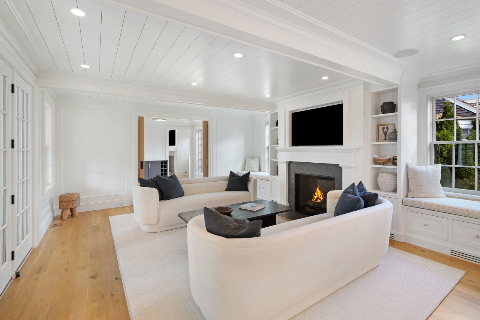 56 North Summer Street Edgartown, MA 02539 - Photo 26 of 77 a living room with furniture a fireplace and a flat screen tv