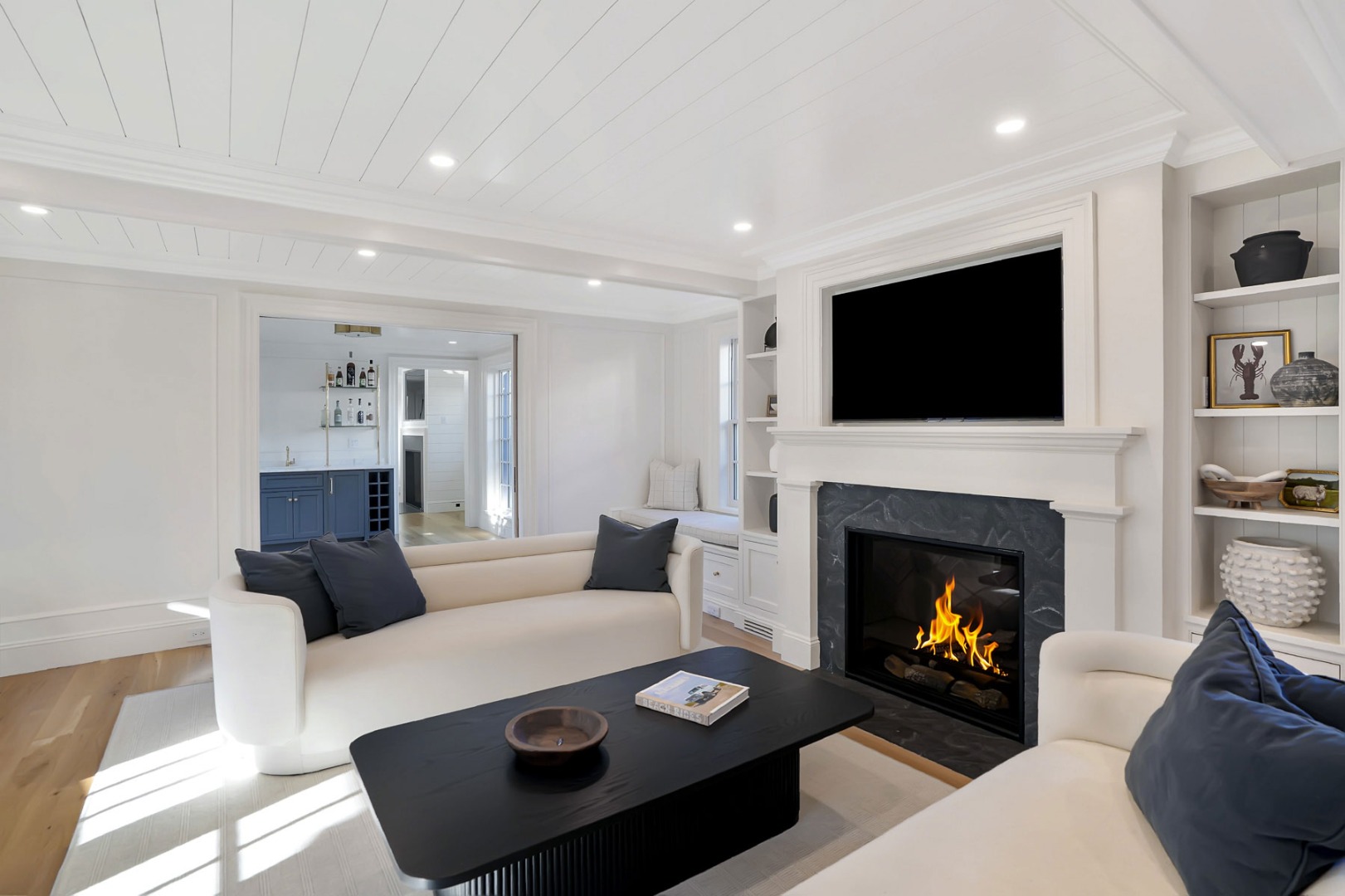 56 North Summer Street Edgartown, MA 02539 - Photo 30 of 77 a living room with furniture a fireplace and a flat screen tv