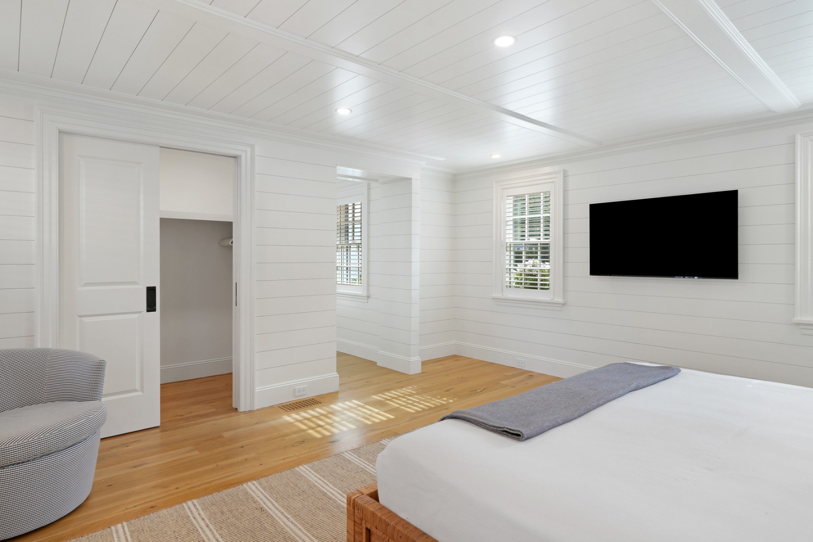 56 North Summer Street Edgartown, MA 02539 - Photo 37 of 77 a bedroom with a bed and a flat screen tv