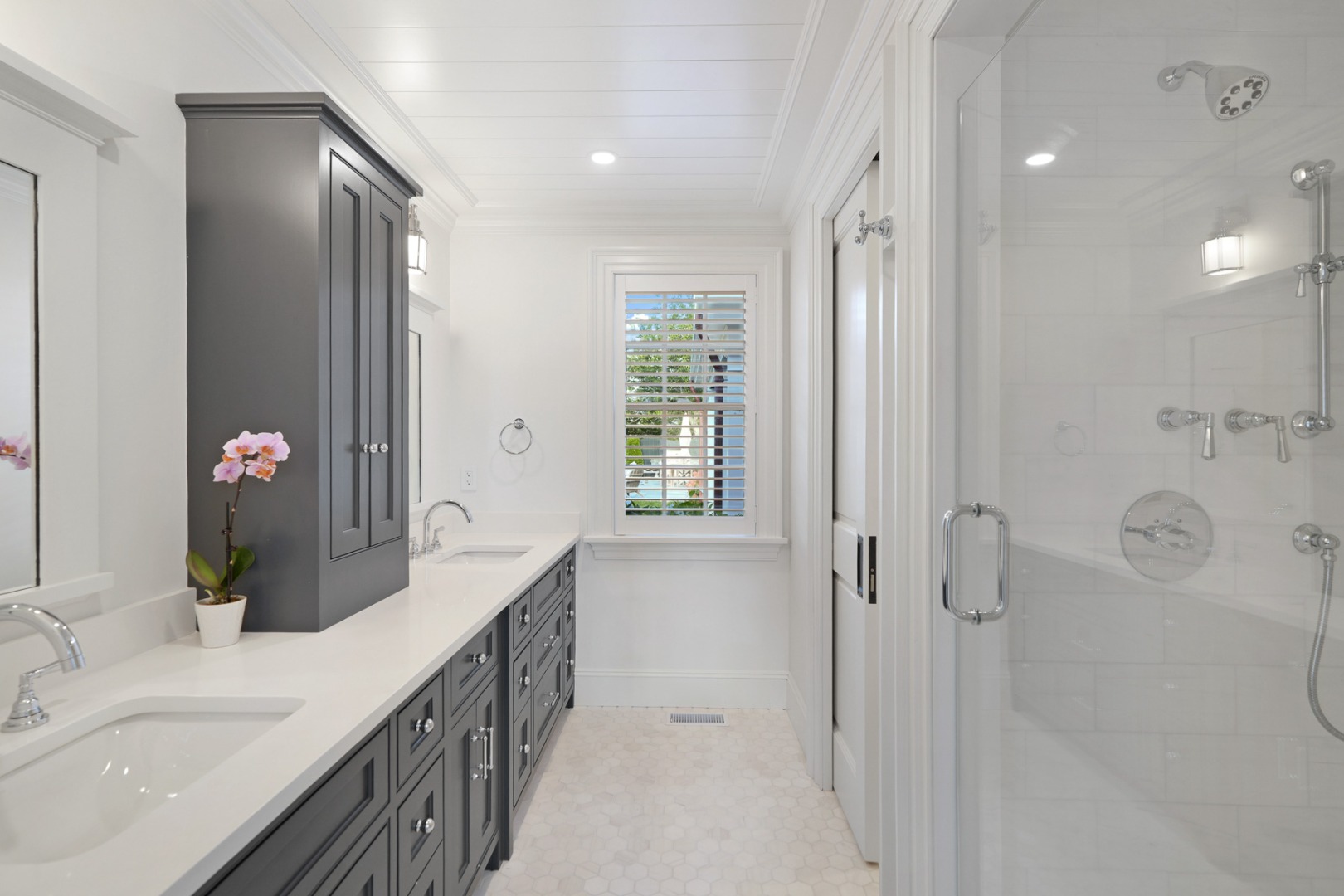 56 North Summer Street Edgartown, MA 02539 - Photo 39 of 77 a bathroom with a granite countertop double vanity sink a mirror and a shower