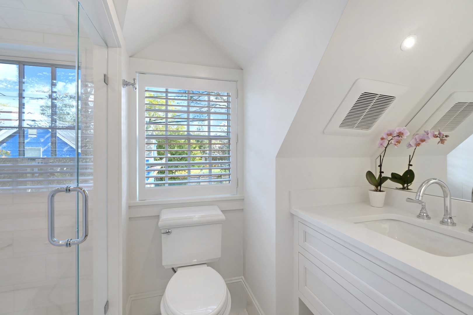 56 North Summer Street Edgartown, MA 02539 - Photo 49 of 77 a bathroom with a sink a toilet and shower