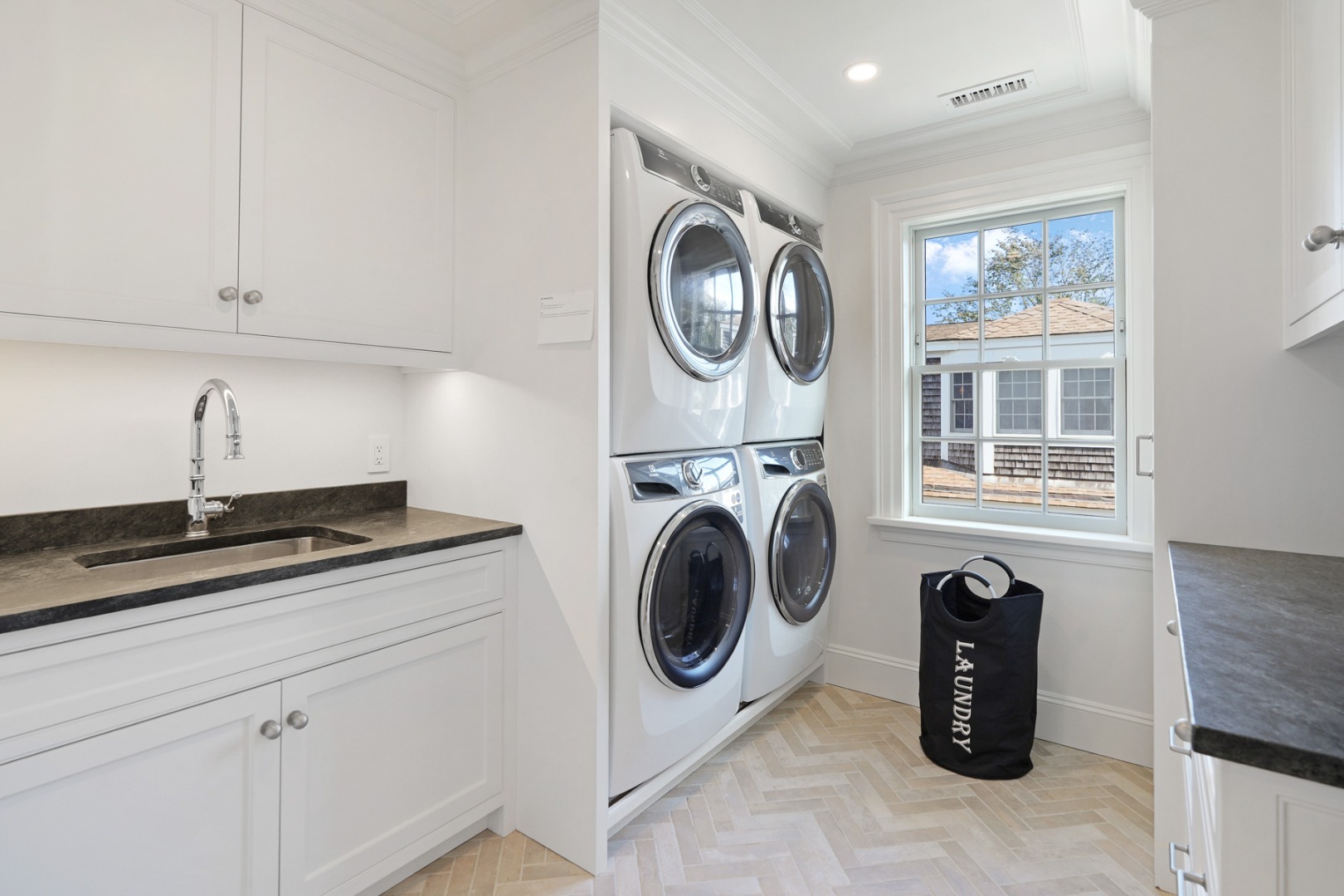 56 North Summer Street Edgartown, MA 02539 - Photo 52 of 77 a utility room with sink dryer and washer