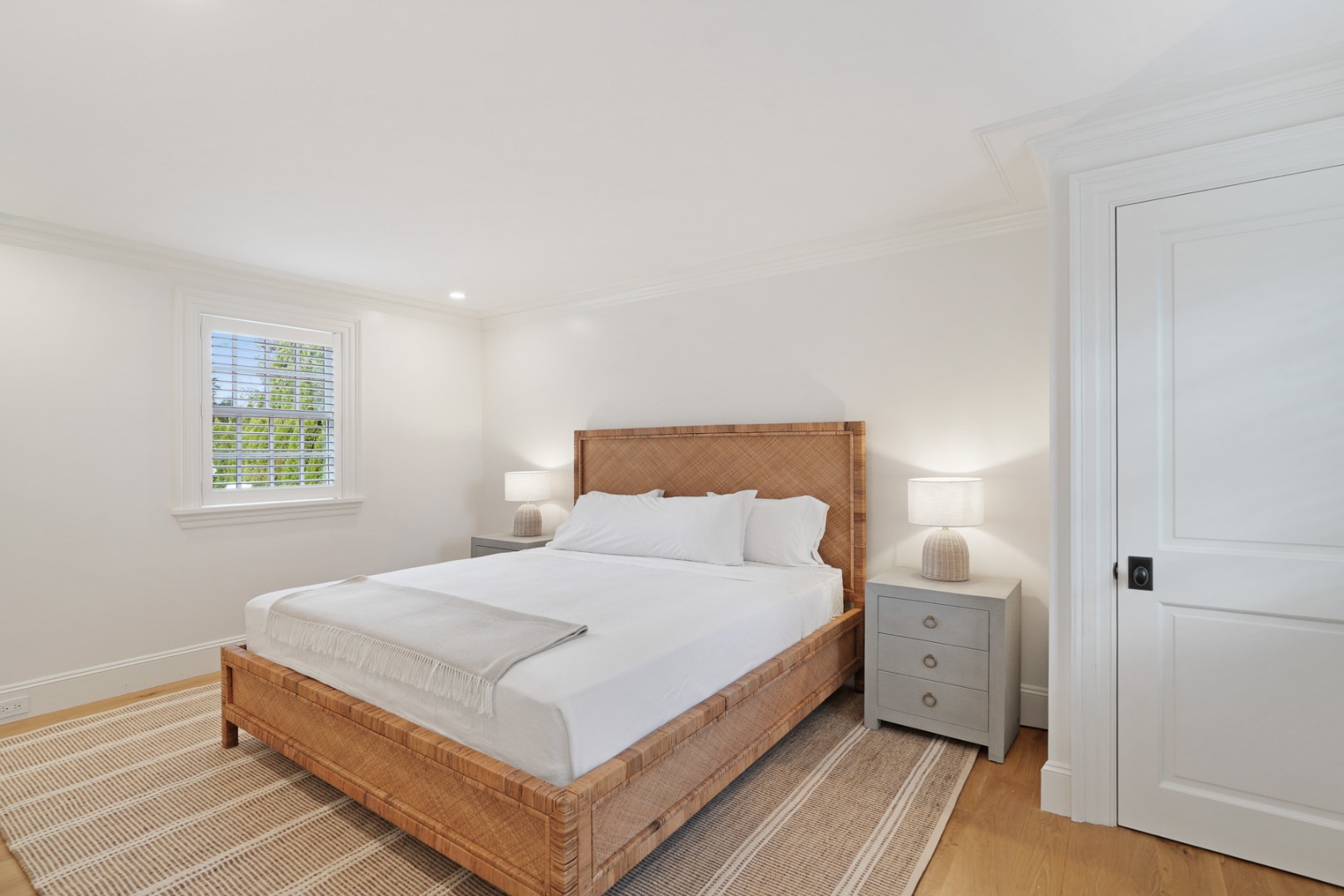 56 North Summer Street Edgartown, MA 02539 - Photo 56 of 77 a bedroom with a bed and a window