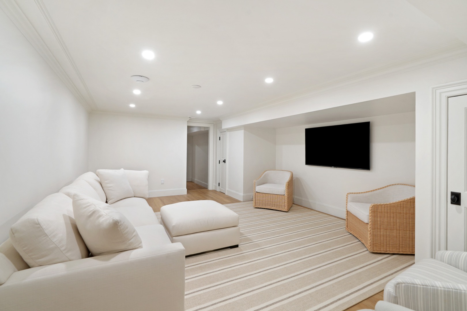 56 North Summer Street Edgartown, MA 02539 - Photo 62 of 77 a living room with furniture and a flat screen tv