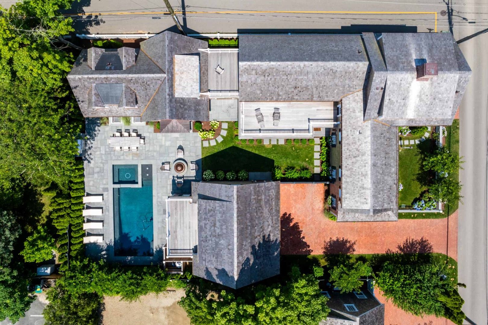 56 North Summer Street Edgartown, MA 02539 - Photo 7 of 77 an aerial view of residential houses with outdoor space and parking