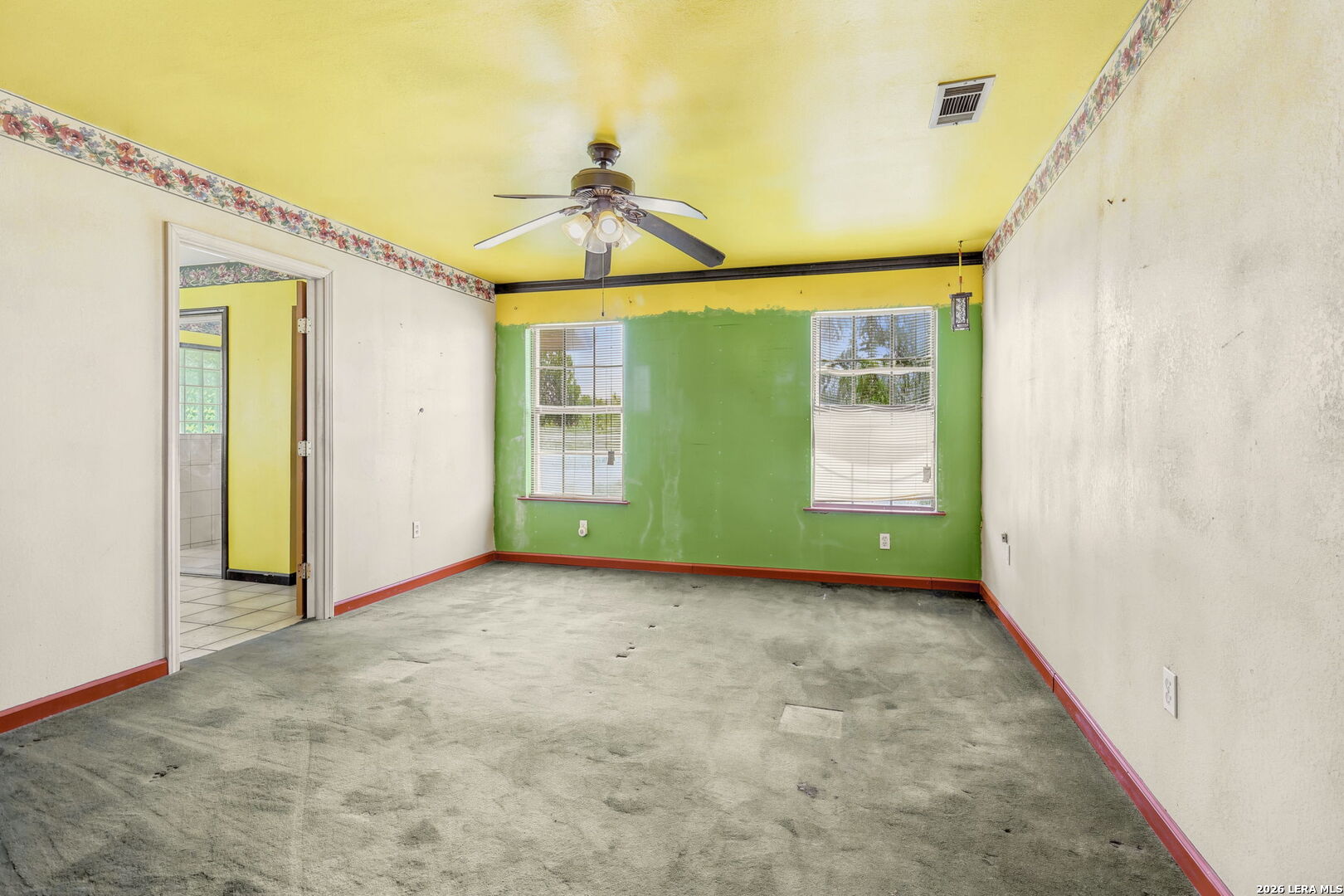 3061 Horse Ranch Road San Antonio, TX 78264 - Photo 16 of 34 a view of an empty room with a window