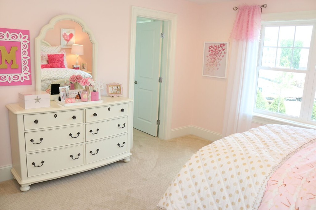 117 Oxbow Road Wayland, MA 01778 - Photo 3 of 4 a bedroom with a dresser next to a window
